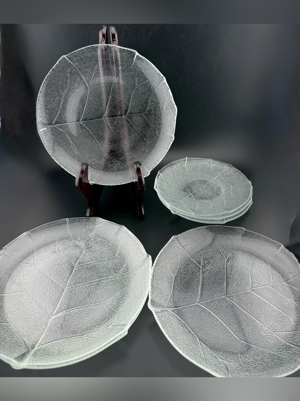 7 Arcoroc “Aspen Leaf” dishes. 4 salad plates (7.25”) 3 small plates (6”)